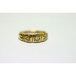 A late Victorian 18ct. gold ring set three small diamonds; & an 18ct. gold & platinum ring set