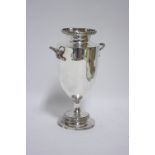 A George V slender ovoid vase with laurel-wreath side handles & rims, on round pedestal foot, 7¾”
