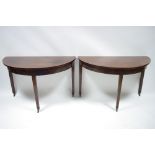 A pair of late 18th century figured mahogany dining table end –sections with  double crossbanding to