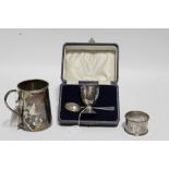 A George V plain round tapered mug, 3½” high, Sheffield 1919; an egg cup & spoon, Birmingham 1919,