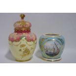 A Royal Crown Derby ovoid vase & cover, the pale yellow ground with raised gilt floral decoration,