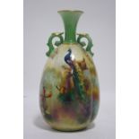 A Royal Worcester porcelain ovoid two-handled vase with short trumpet-shaped neck, the body