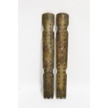A pair of Chinese bronze rectangular scroll weights with engraved calligraphy. 10” long.