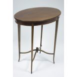 An Edwardian mahogany oval occasional table with narrow satinwood crossbanding, & on slender