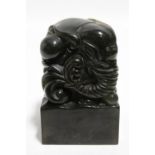 A Chinese dark green jade large seal in the form of an elephant, on square base with inscriptions;