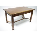 A late 19th/early 20th century walnut rectangular centre table fitted oak-lined drawer to one