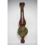 An early 19th century mahogany & marquetry decorated banjo barometer, the 8” silvered dial