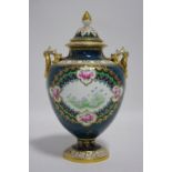 A Royal Crown Derby porcelain two-handled ovoid vase & cover of “midnight-blue” ground, the centre