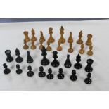 A SIMILAR STAUNTON PATTERN TURNED BOXWOOD CHESS SET of black and natural-stained colour (size of