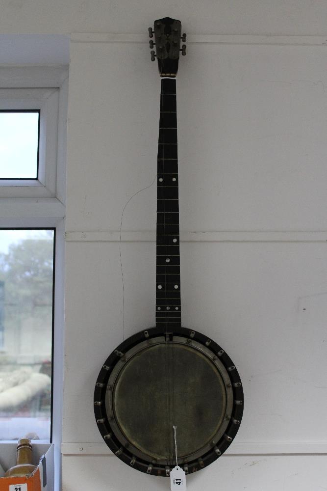 A Duldet five-string banjo, 37" long; together with a standard violin; and a child’s violin.