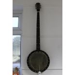 A Duldet five-string banjo, 37" long; together with a standard violin; and a child’s violin.