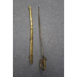 A George V Cavalry officer’s dress sword, the 32¼” long single-edge curved blade with etched