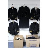 Six British Royal Navy Officer’s dress jackets; four ditto caps; and various ditto shirts, etc.