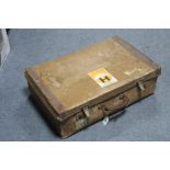 An early 20th century fibre-covered & leather-bound suitcase with chrome twin-lever locks, bears