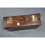 A late 19th/early 20th  century tan leather brass studded suitcase fitted brass twin-lever locks,