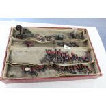 A collection of approximately sixty Britain’s painted lead soldier figures (including twenty-four