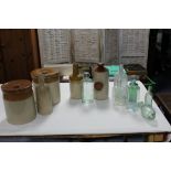 Various stoneware bottles & jars; and various glass bottles.