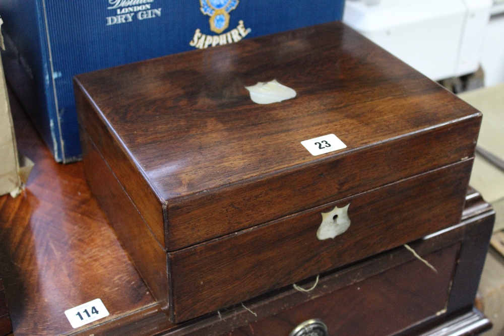 A 19th century rosewood & mother-of-pearl inlaid needlework box, 11¾" wide; and six volumes by