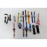 Nineteen various Swatch wristwatches.