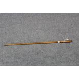 A late 19th/early 20th century treen horse-measuring stick with brass fittings, and with cane