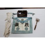 A Masonic regalia apron & pair of gloves with leather case, stamped “Sun & Sector Lodge No. 962,
