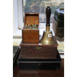 A cast-brass hand-bell with turned wood handle; together with an oak document box; two japanned-