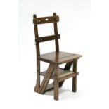 A late Victorian oak metamorphic library chair/steps.
