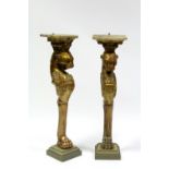 A pair of regency-style carved giltwood & gesso pedestals with leopard masks & paw feet; 9½" wide