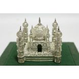 An eastern filigree model of a mosque; 3½” high x 3½” wide.