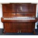 A BECHSTEIN UPRIGHT PIANOFORTE, with over-strung iron frame No. 102421, in rosewood case; 54"