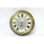 7. A ship’s wall clock with black Roman numerals & subsidiary seconds dial to the cream enamel