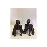 Pair of naked female figures positioned