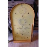 A vintage Bagatelle game with ball beari
