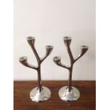 A pair of three tiered antler design can