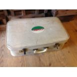 A vintage suitcase with a Welsh plate Cy