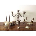 A large collection of metal/plated candl