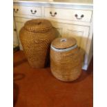 2 floor standing linen baskets with lids