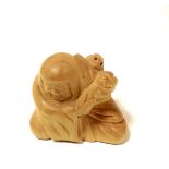 A signed carved wooden netsuke of Bodhid