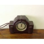 An Art Deco Bakelite clock.