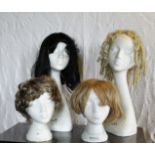 Four wigs. (4)