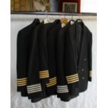 Six airline pilot jackets and three shir