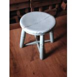 A small painted stool.