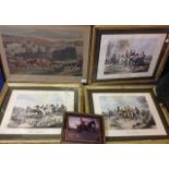 Four framed fox hunting prints plus a fr