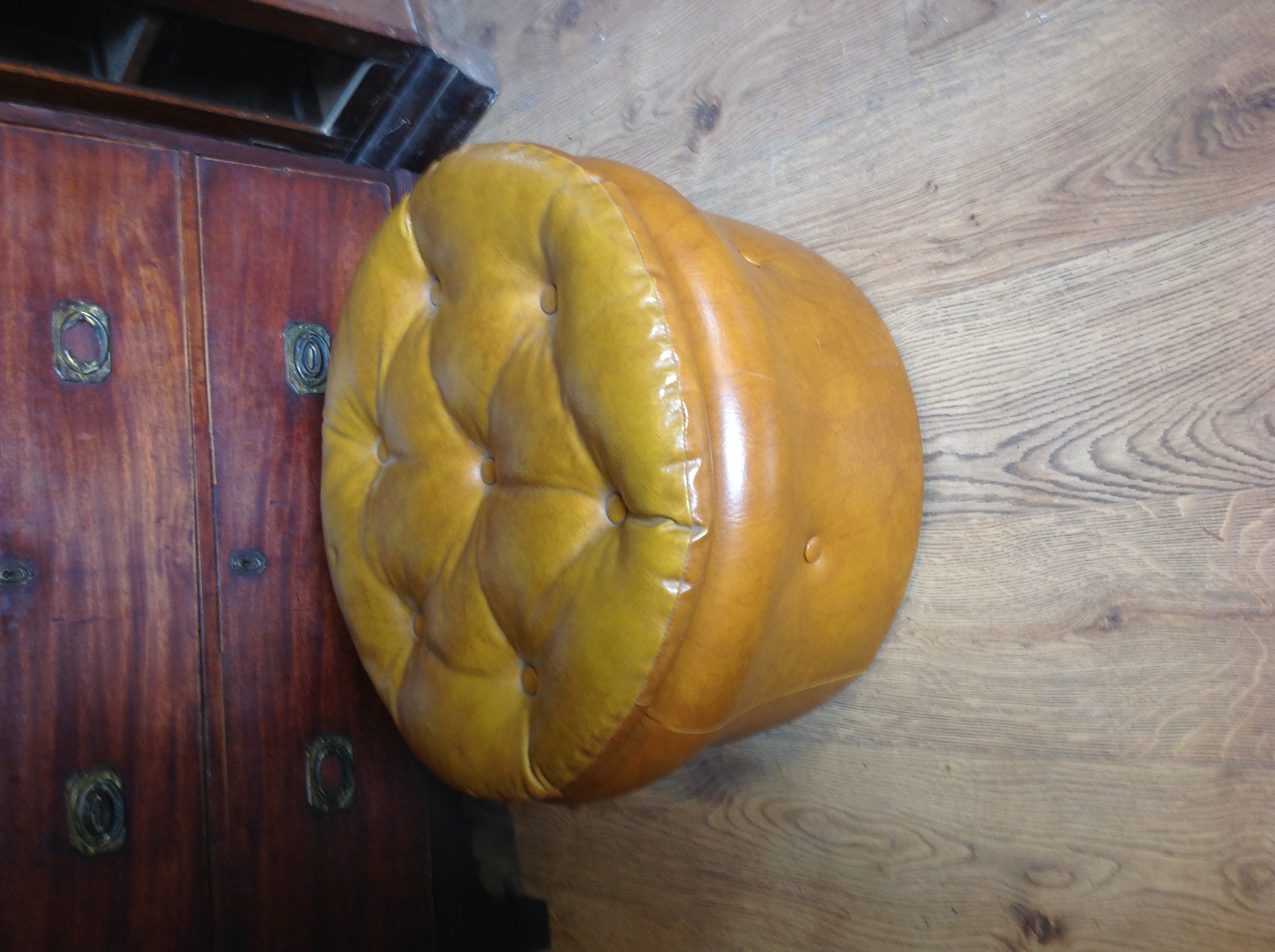 A foot stool poof by Sherborne..