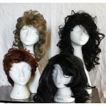 Four wigs. (4)
