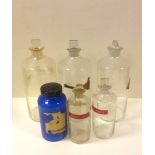 Various apothecary chemical storage bottles