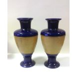 A pair of Royal Doulton vases. 38cm. (2)