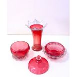 Three pieces of fluted cranberry glass,