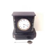 A slate key wind mantle clock. AF.