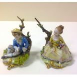 A pair of Capodimonte porcelain figures